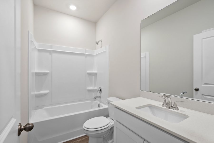 Furnished interior view inside a new home in Cypress Ridge - The Coastline Series, Longs (Image 12).