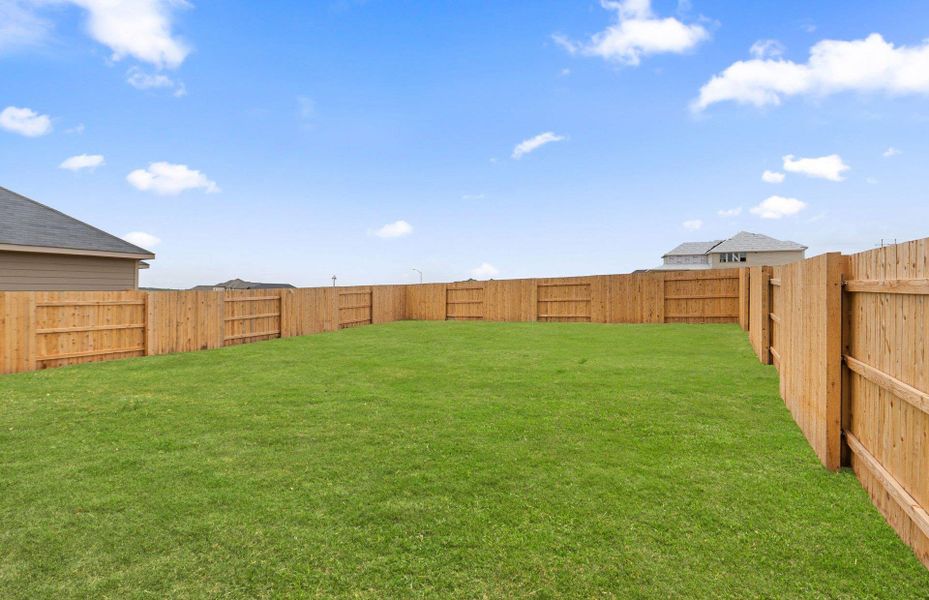 Exterior details and patio area of a home in Sunfield, Buda (Image 19).