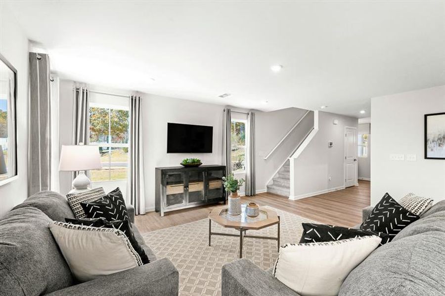 Representative furnished interior of a home built from the Woodford by Ryan Homes in Oakwood Trace, Fairburn (Image 18).