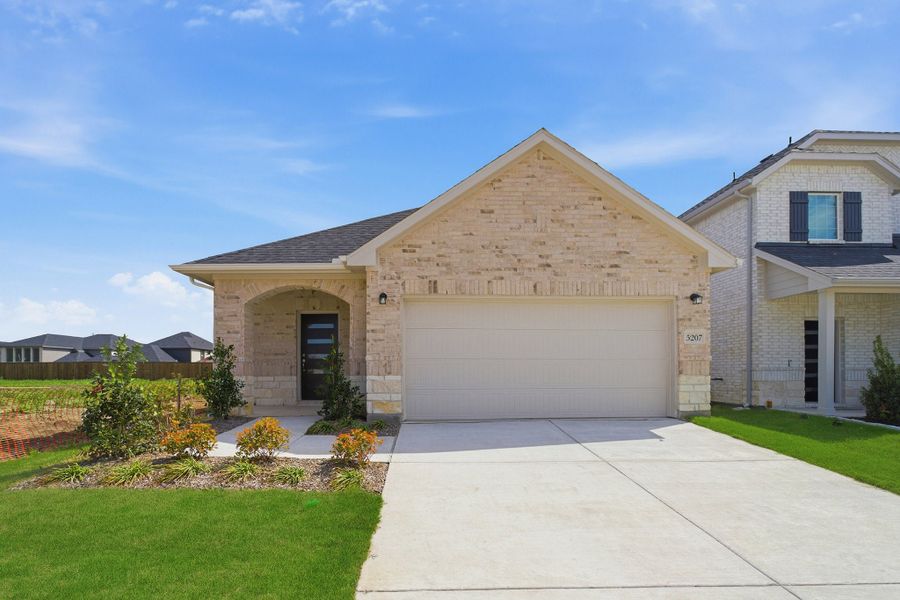 Front exterior of a new home in Westridge, McKinney, TX, highlighting curb appeal (Image 1). Front exterior of a new home in Westridge, McKinney, TX, highlighting curb appeal (Image 1).