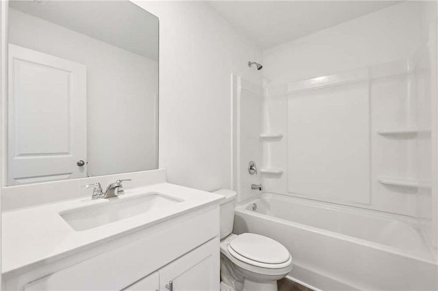 Furnished interior view inside a new home in Eastlyn Crossing, Flowery Branch (Image 11).