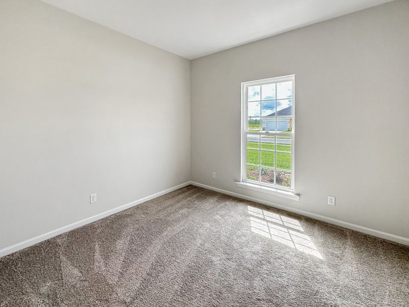 Spacious, unfurnished interior of a new home in Doctor's Creek, Ludowici (Image 19).