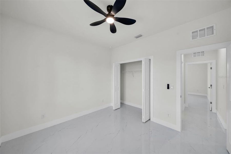 Spacious, unfurnished interior of a new home in , Port Charlotte (Image 26).