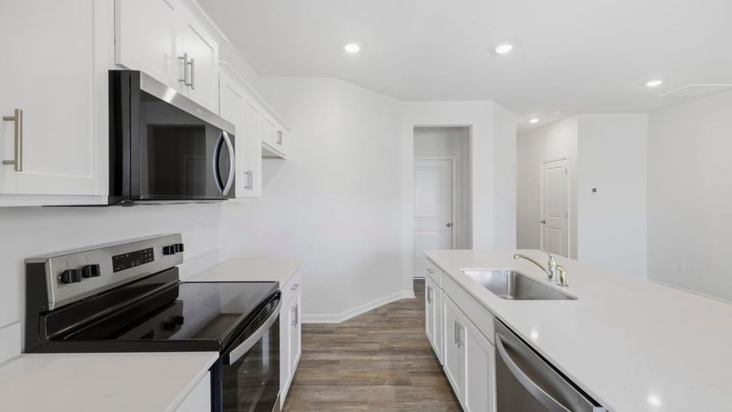 Furnished interior view inside a new home in Tanglewood Townes, Greenville (Image 10).