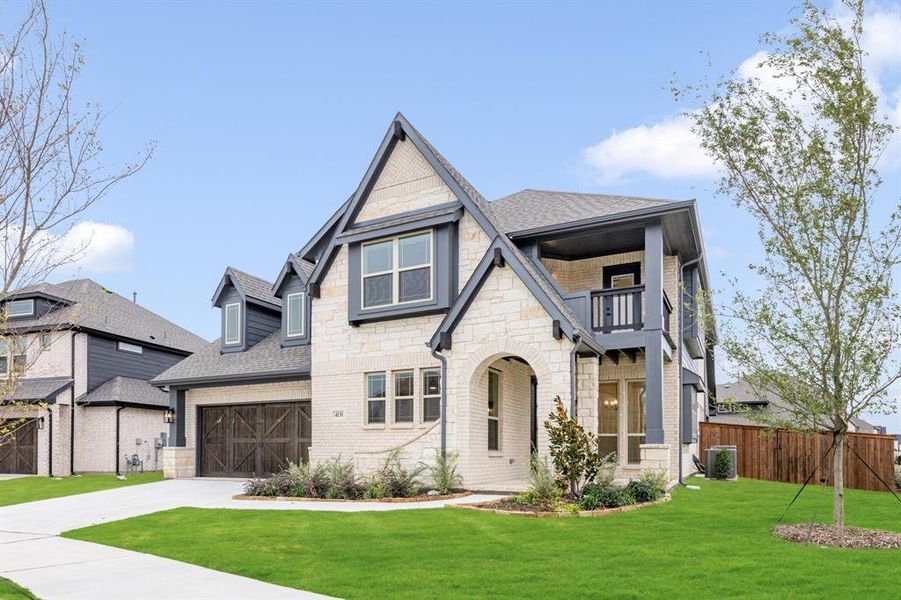 Front exterior of a new home in Windsong Ranch Classic 61, Prosper, TX, highlighting curb appeal (Image 2). Front exterior of a new home in Windsong Ranch Classic 61, Prosper, TX, highlighting curb appeal (Image 2).