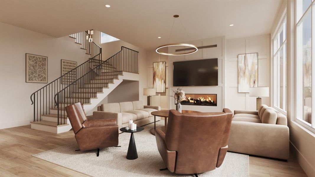 Family Room with a 72" Direct Vent Linear Gas Fireplace with a Slab Quartz Surround, Block Paneling on the Fireplace Facade and Back Walls.