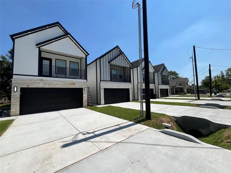 Front exterior of a new home in , Houston, TX, highlighting curb appeal (Image 1). Front exterior of a new home in , Houston, TX, highlighting curb appeal (Image 1).