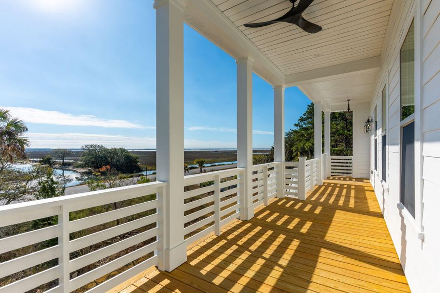 Exterior details and patio area of a home in Overlook at Copahee Sound, Awendaw (Image 43).
