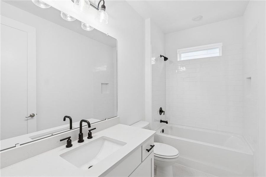 Furnished interior view inside a new home in Maple Grove at Towne Lake, Woodstock (Image 7).