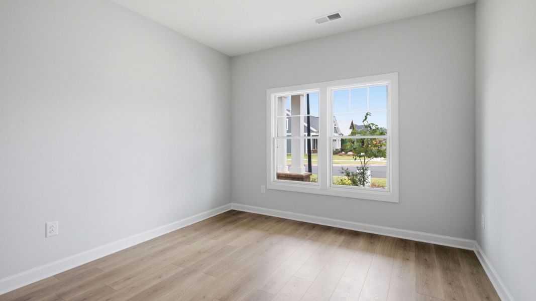 Spacious, unfurnished interior of a new home in The Courtyards at Oak Grove, Durham (Image 16).