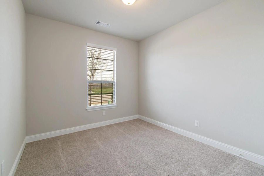 Bedroom 2 | Concept 2129 at Redden Farms - Classic Series in Midlothian, TX by Landsea Homes