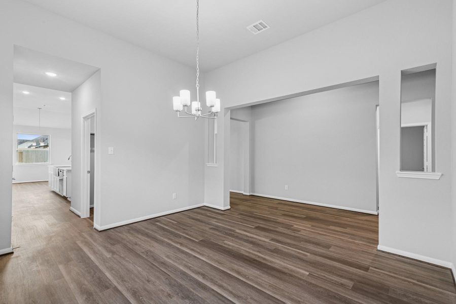 Formal dining room with access to the kitchen Formal dining room with access to the kitchen