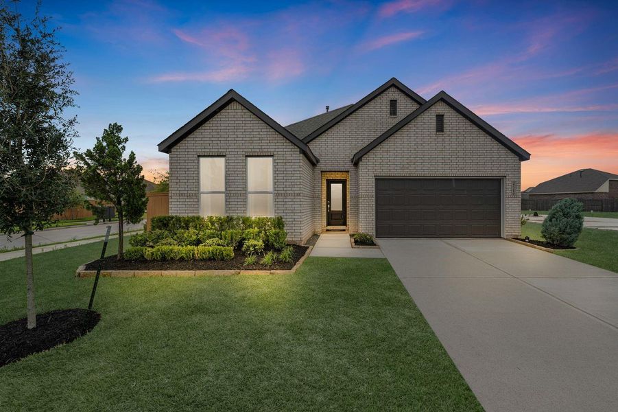 Front exterior of a new home in , Katy, TX, highlighting curb appeal (Image 1). Front exterior of a new home in , Katy, TX, highlighting curb appeal (Image 1).