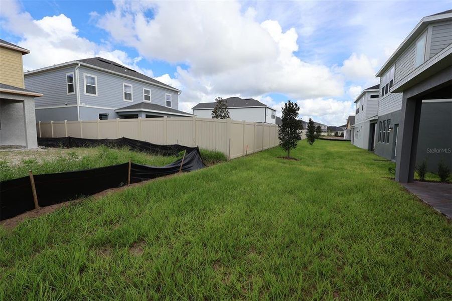 Exterior details and patio area of a home in Bay Lake Farms, St. Cloud (Image 33).