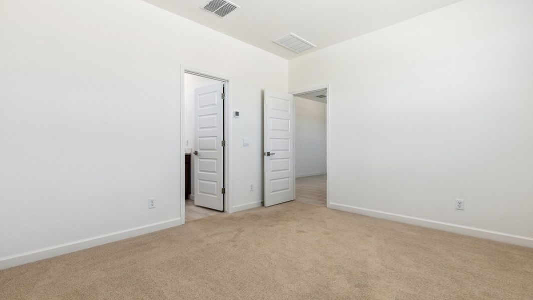 Spacious, unfurnished interior of a new home in Zanjero Pass, Waddell (Image 20).