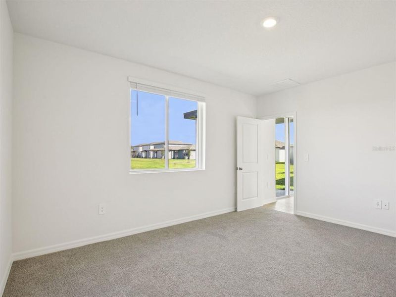 Spacious, unfurnished interior of a new home in Oakfield Trails - Premier Series, Parrish (Image 15).