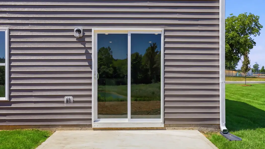 Exterior details and patio area of a home in Bynum Farms, Farmville (Image 4).