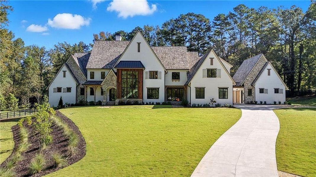 Front exterior of a new home in Crossroads, Alpharetta, GA, highlighting curb appeal (Image 29).