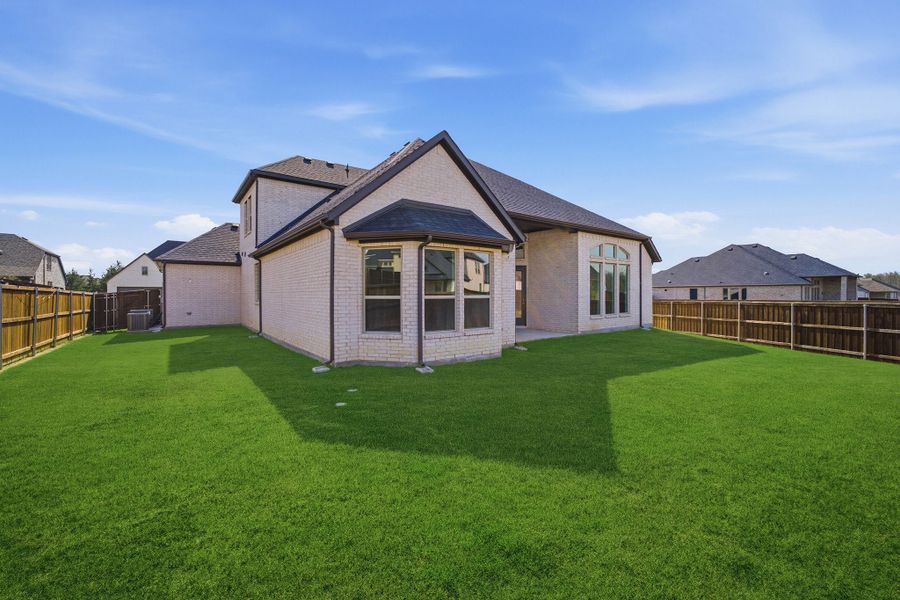 Exterior details and patio area of a home in Sonoma Verde, Heath (Image 23).