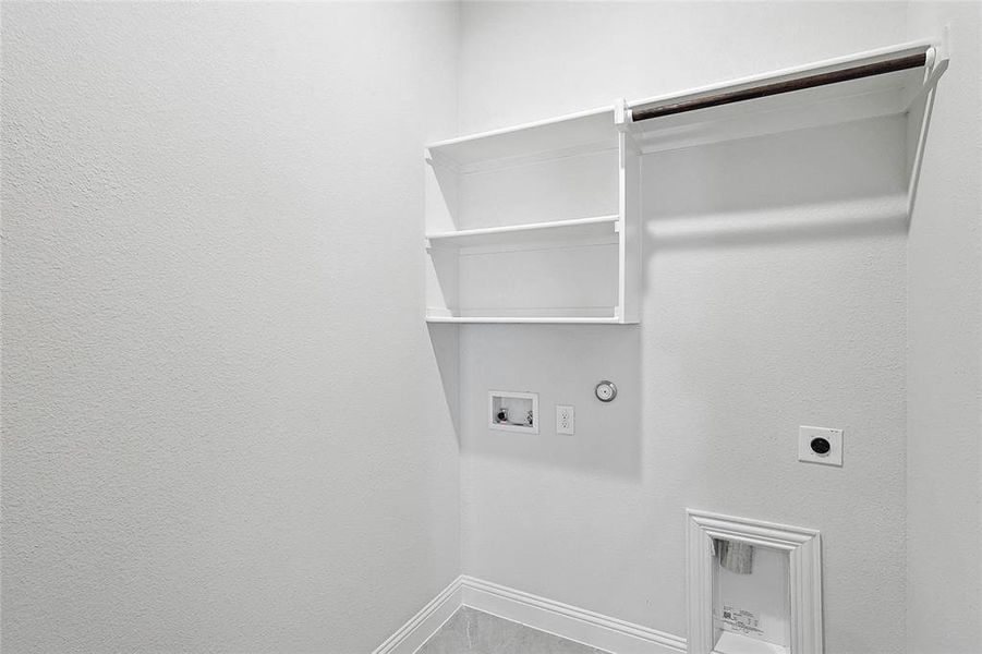 Laundry room featuring gas dryer hookup, electric dryer hookup, and hookup for a washing machine