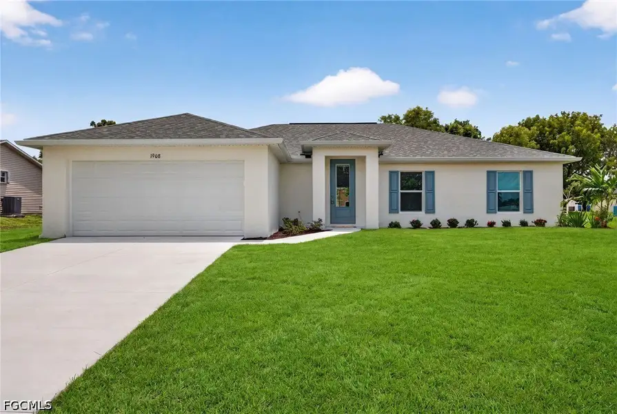 Front exterior of a new home in Cape Coral, Cape Coral, FL, highlighting curb appeal (Image 1). Front exterior of a new home in Cape Coral, Cape Coral, FL, highlighting curb appeal (Image 1).