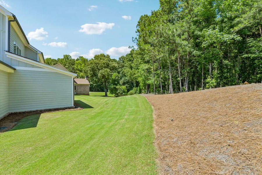 Exterior details and patio area of a home in White Post on Lake Lanier, Gainesville (Image 24).