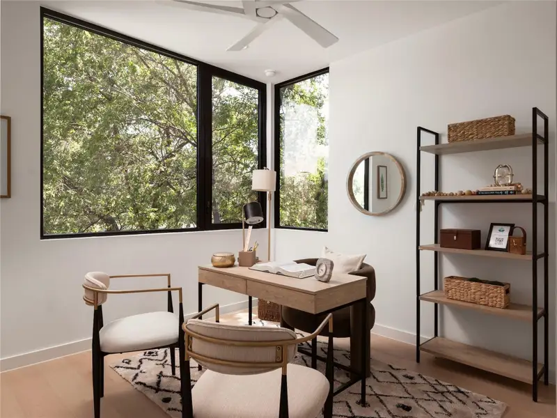 An airy secondary bedroom with en-suite bathroom features abundant natural light, fostering an ideal work-from-home environment. An airy secondary bedroom with en-suite bathroom features abundant natural light, fostering an ideal work-from-home environment.
