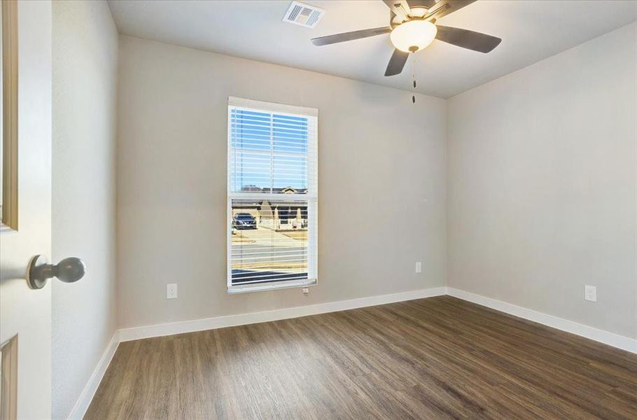 Spacious, unfurnished interior of a new home in Miller Street Cottages, Denison (Image 20).