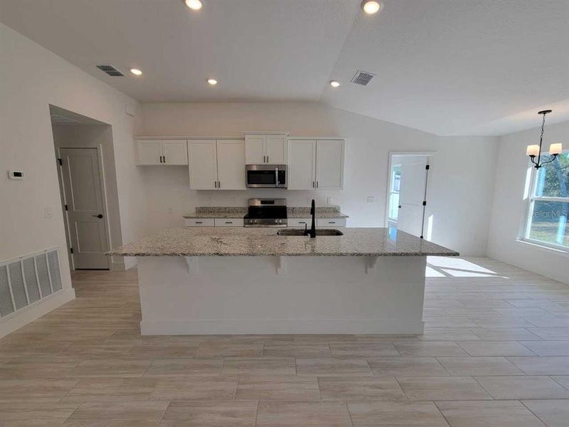 Furnished interior view inside a new home in , Ocala (Image 4).