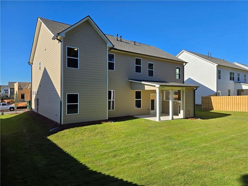 Exterior details and patio area of a home in Enclave at Logan Point, Loganville (Image 4). Exterior details and patio area of a home in Enclave at Logan Point, Loganville (Image 4).