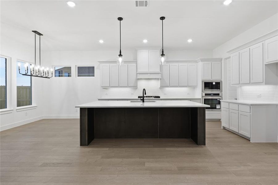 Furnished interior view inside a new home in Pecan Grove, Cross Timber (Image 9).