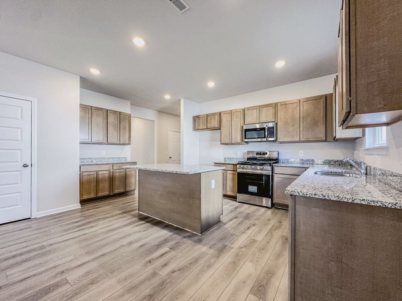Representative furnished interior of a home built from the The Hampton by Smith Douglas Homes in Enclave at Willis, Willis (Image 5).