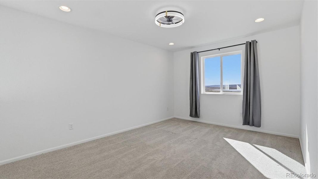 Upper level Loft with view window.