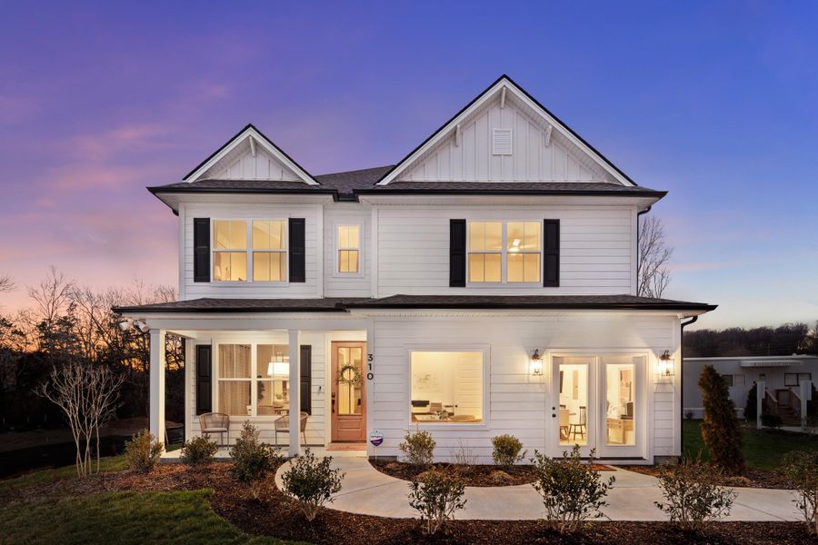 Front exterior of a new home in Sweetgrass Station, Summerville, SC, highlighting curb appeal (Image 23). Front exterior of a new home in Sweetgrass Station, Summerville, SC, highlighting curb appeal (Image 23).