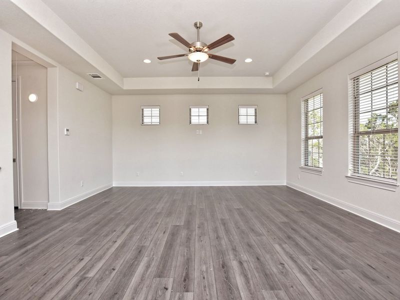 Representative unfurnished interior of a home built from the Game Room by Giddens Homes in Whispering Wind, Bertram (Image 10).