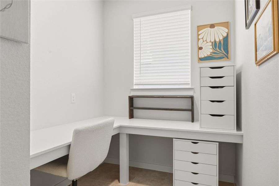 Unfurnished office with built in study area