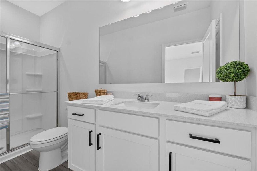 Furnished interior view inside a new home in Pender Woods at Cane Bay, Summerville (Image 28).