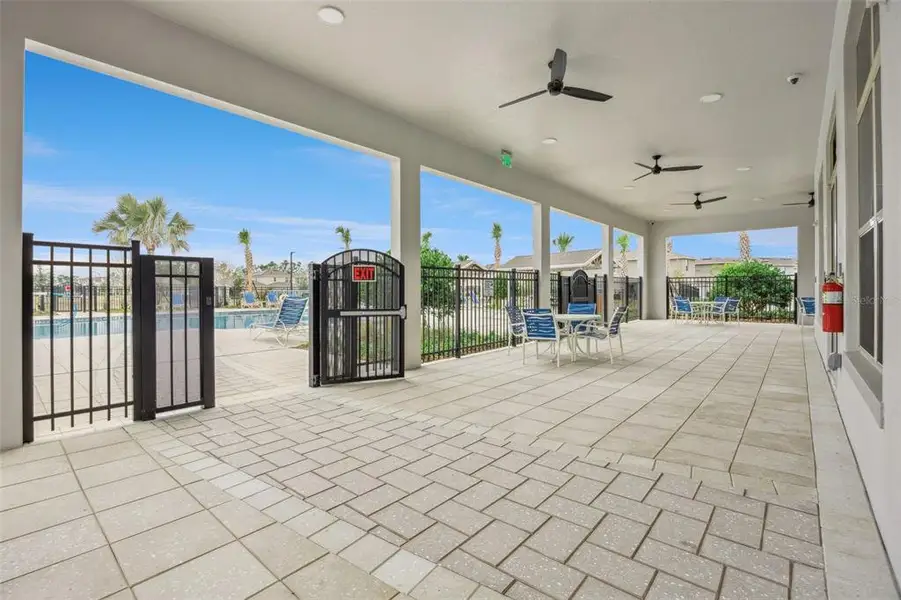 Exterior details and patio area of a home in Waterleigh, Winter Garden (Image 25).
