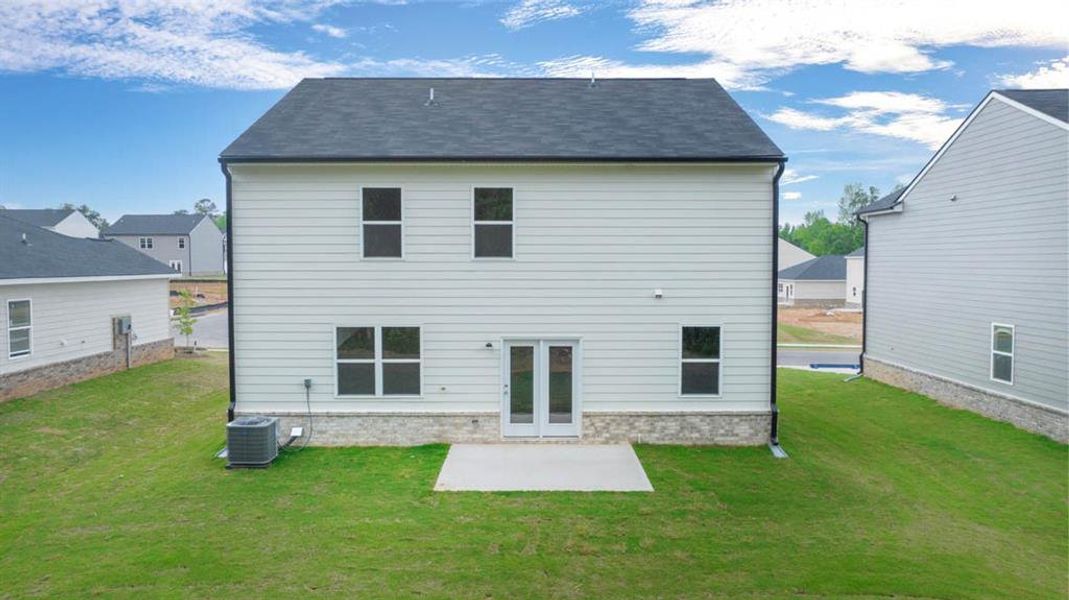 Exterior details and patio area of a home in The Reserve at Calcutta, Stockbridge (Image 20).