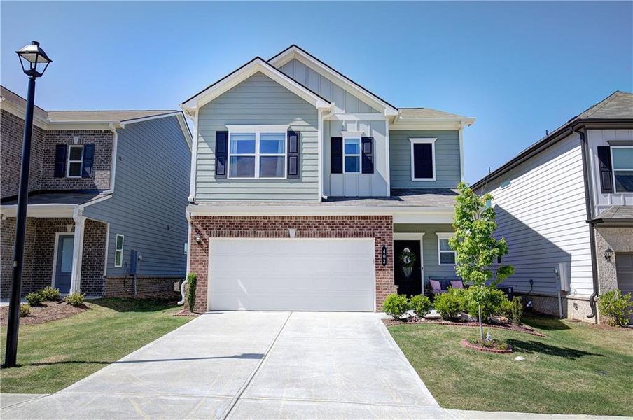 Front exterior of a new home in , Cartersville, GA, highlighting curb appeal (Image 21).