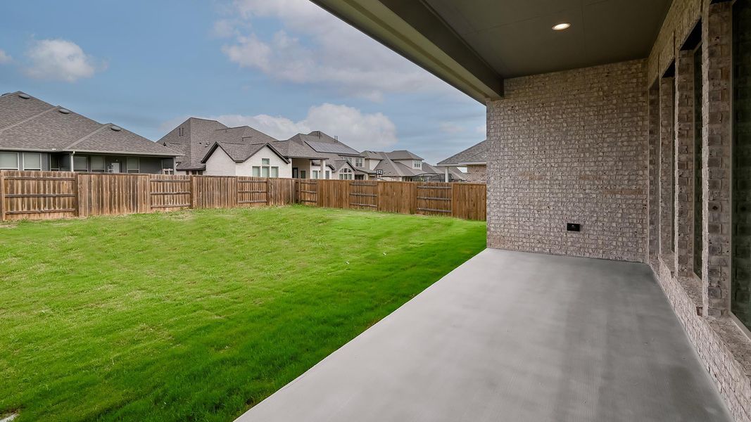 View of yard with a patio, a residential view, and a fenced backyard