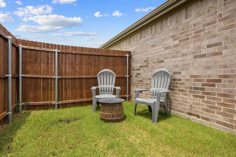 Exterior details and patio area of a home in Leonard Crossing, Leonard (Image 4).