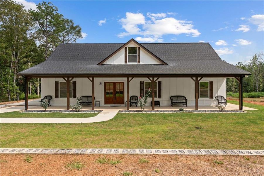 Front exterior of a new home in , Carrollton, GA, highlighting curb appeal (Image 22).