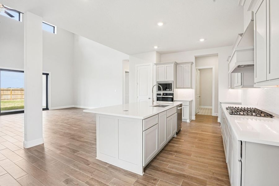 Furnished interior view inside a new home in Del Bello Lakes 60', Manvel (Image 9).