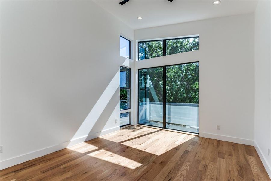 Spare room with light hardwood / wood-style floors and ceiling fan