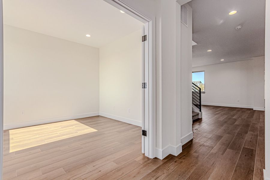 Spacious, unfurnished interior of a new home in West Grange, Longmont (Image 39).