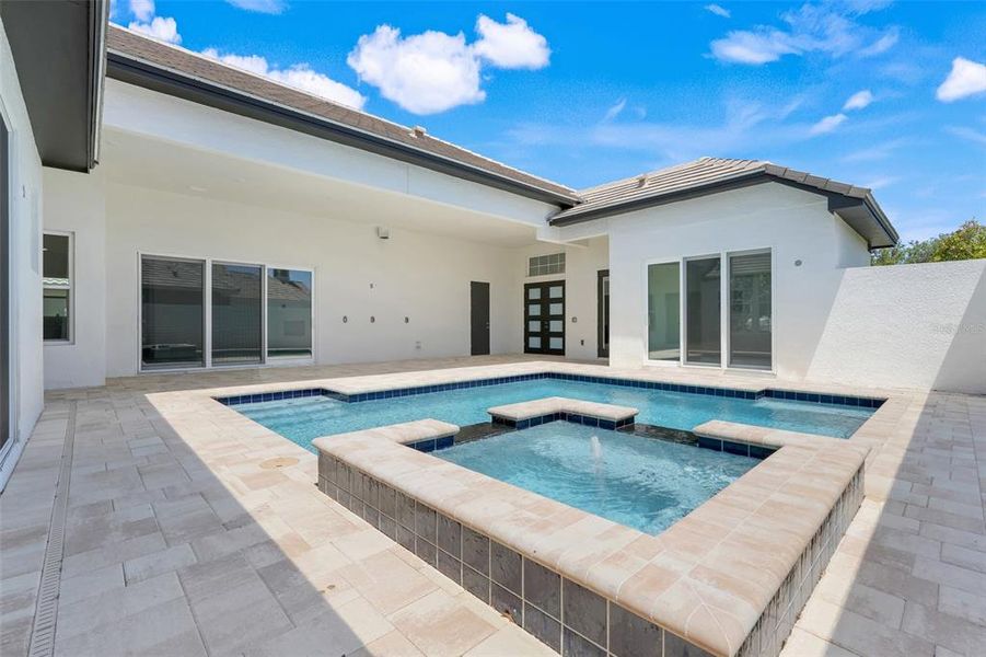 Exterior details and patio area of a home in Toscana, Palm Coast (Image 25).