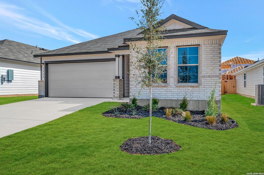 Front exterior of a new home in Meadows at Clear Springs, New Braunfels, TX, highlighting curb appeal (Image 2). Front exterior of a new home in Meadows at Clear Springs, New Braunfels, TX, highlighting curb appeal (Image 2).