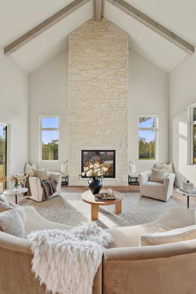 Grand Great Room with High Ceilings and Large Fireplace