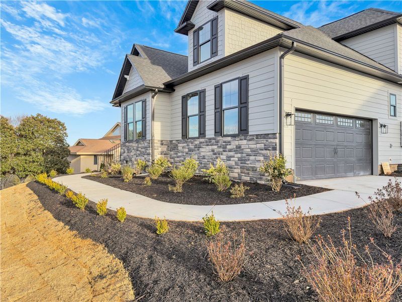 Front exterior of a new home in Cross Creek Golf Club, Seneca, SC, highlighting curb appeal (Image 21).